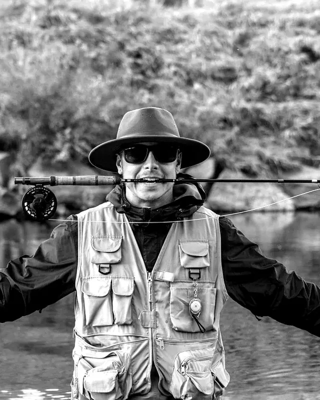 Fly fishing guide at the water